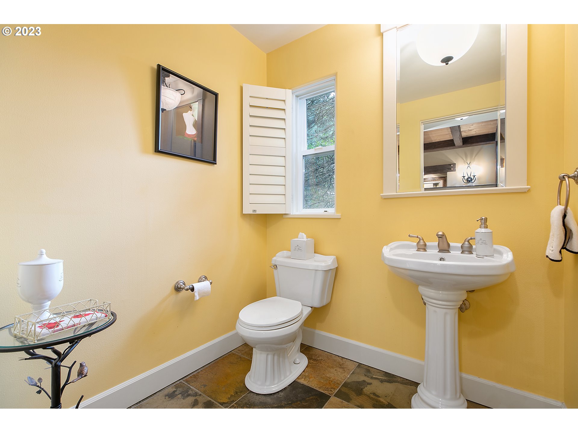 4027 Northwest Devoto Lane Portland, OR 97229 - Photo 23 of 48 a bathroom with a toilet and a sink