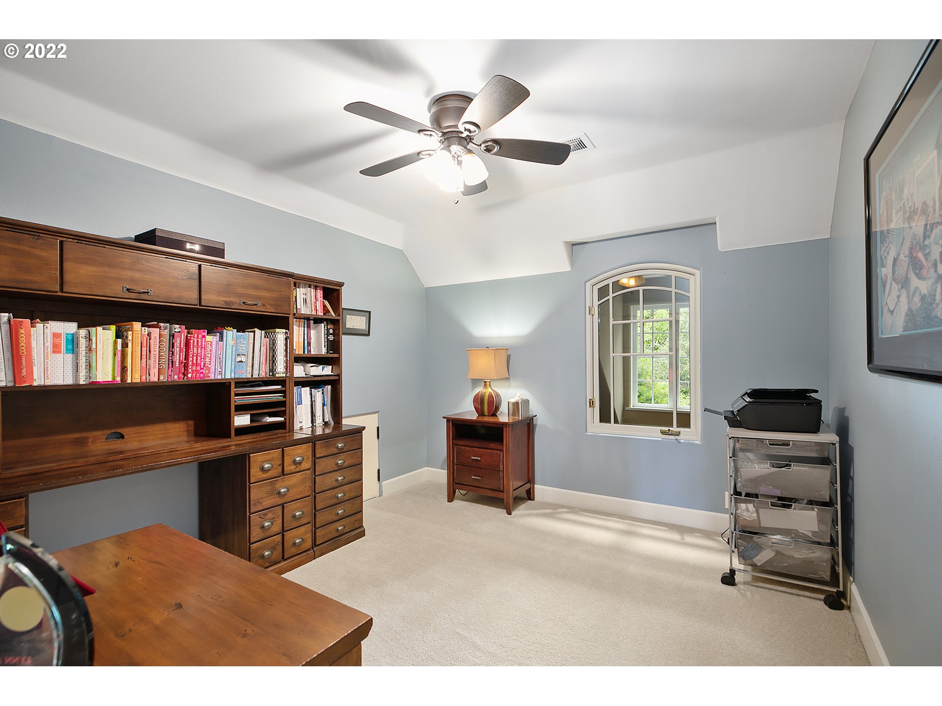 4027 Northwest Devoto Lane Portland, OR 97229 - Photo 24 of 48 a living room with furniture cabinets and window