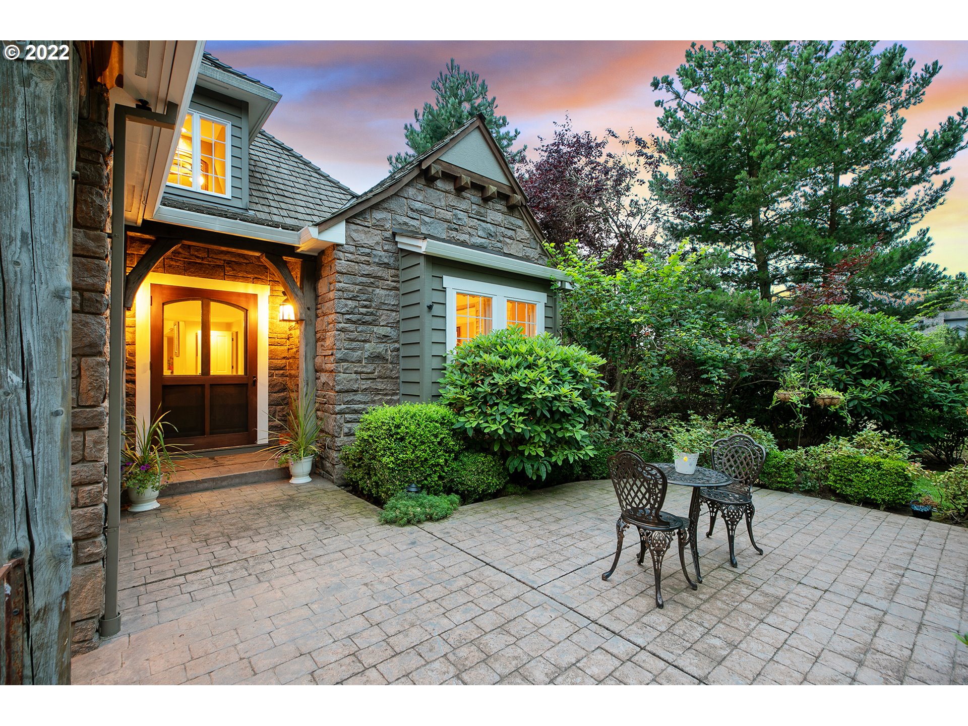 4027 Northwest Devoto Lane Portland, OR 97229 - Photo 3 of 48 a view of backyard with a patio and a garden