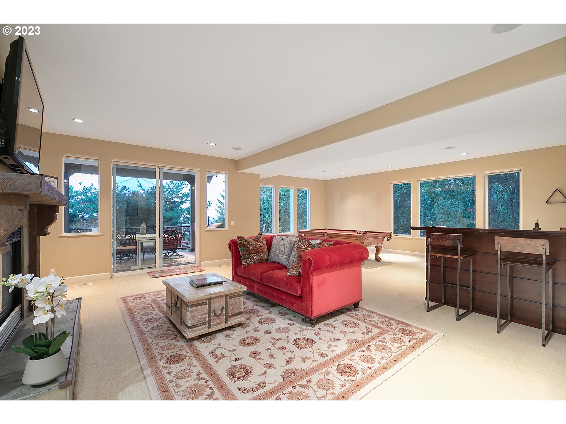 4027 Northwest Devoto Lane Portland, OR 97229 - Photo 30 of 48 a living room with furniture window and wooden floor
