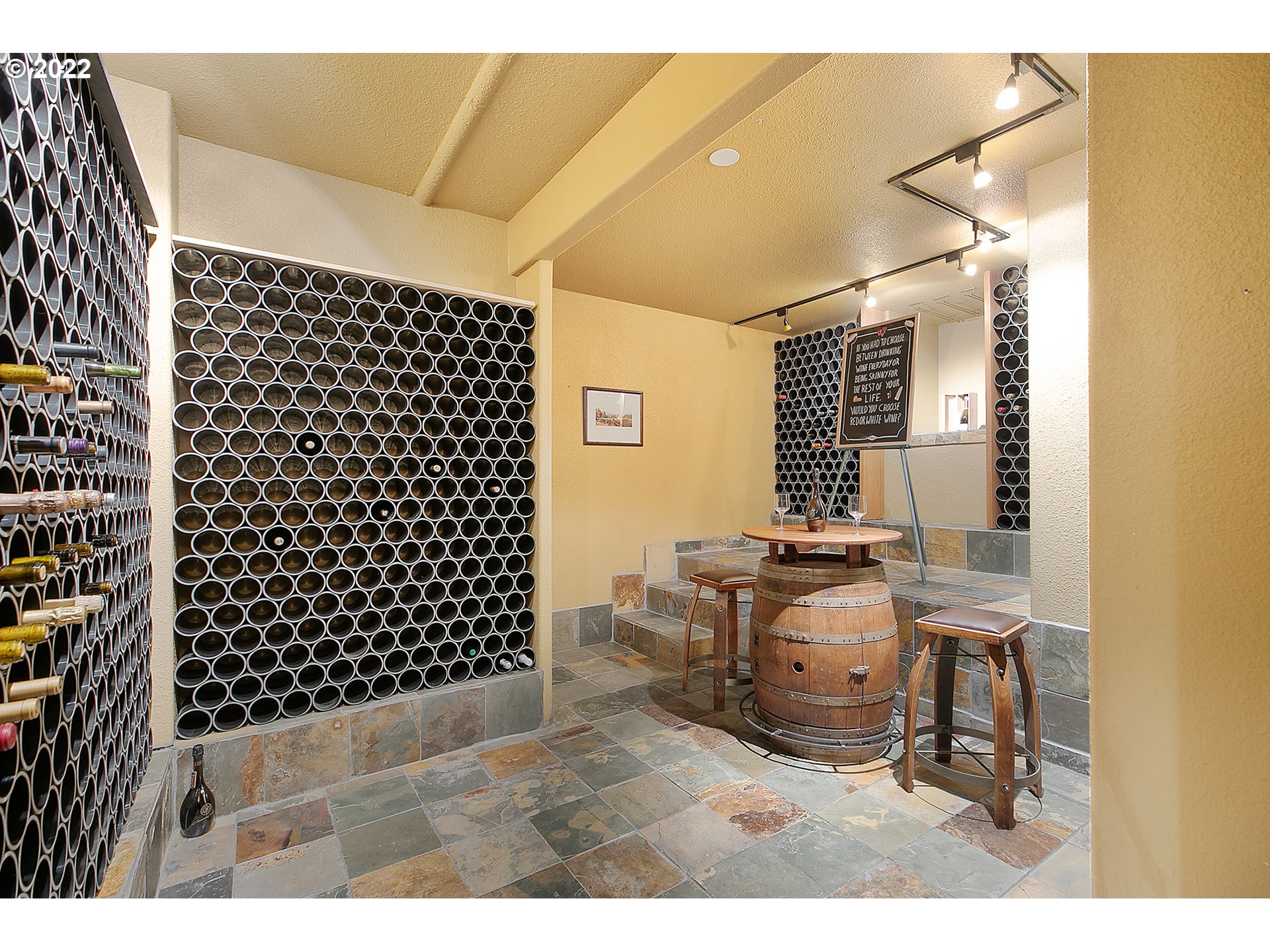 4027 Northwest Devoto Lane Portland, OR 97229 - Photo 33 of 48 a bathroom with a sink a mirror and a shower