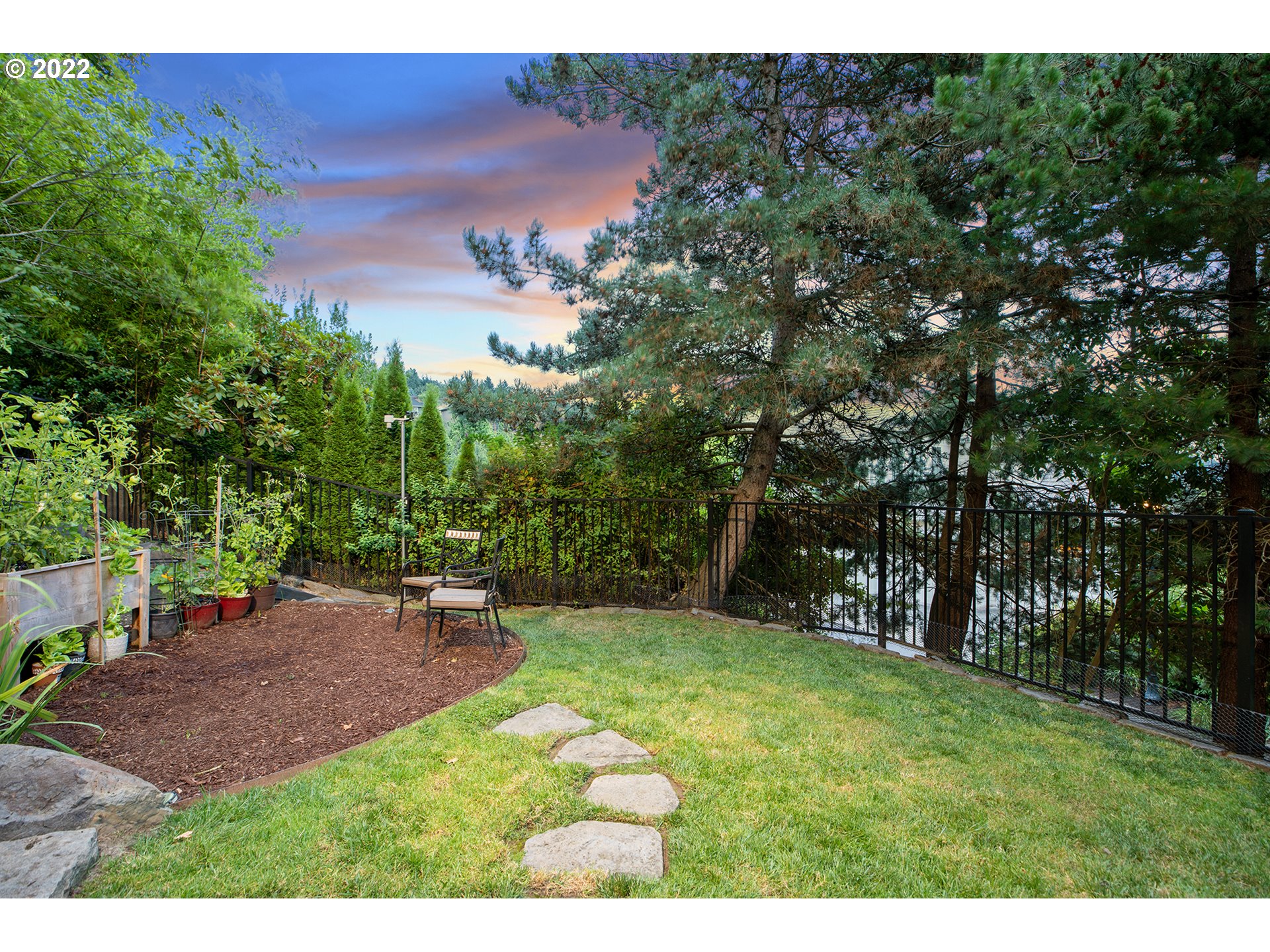 4027 Northwest Devoto Lane Portland, OR 97229 - Photo 39 of 48 a backyard of a house with lots of green space
