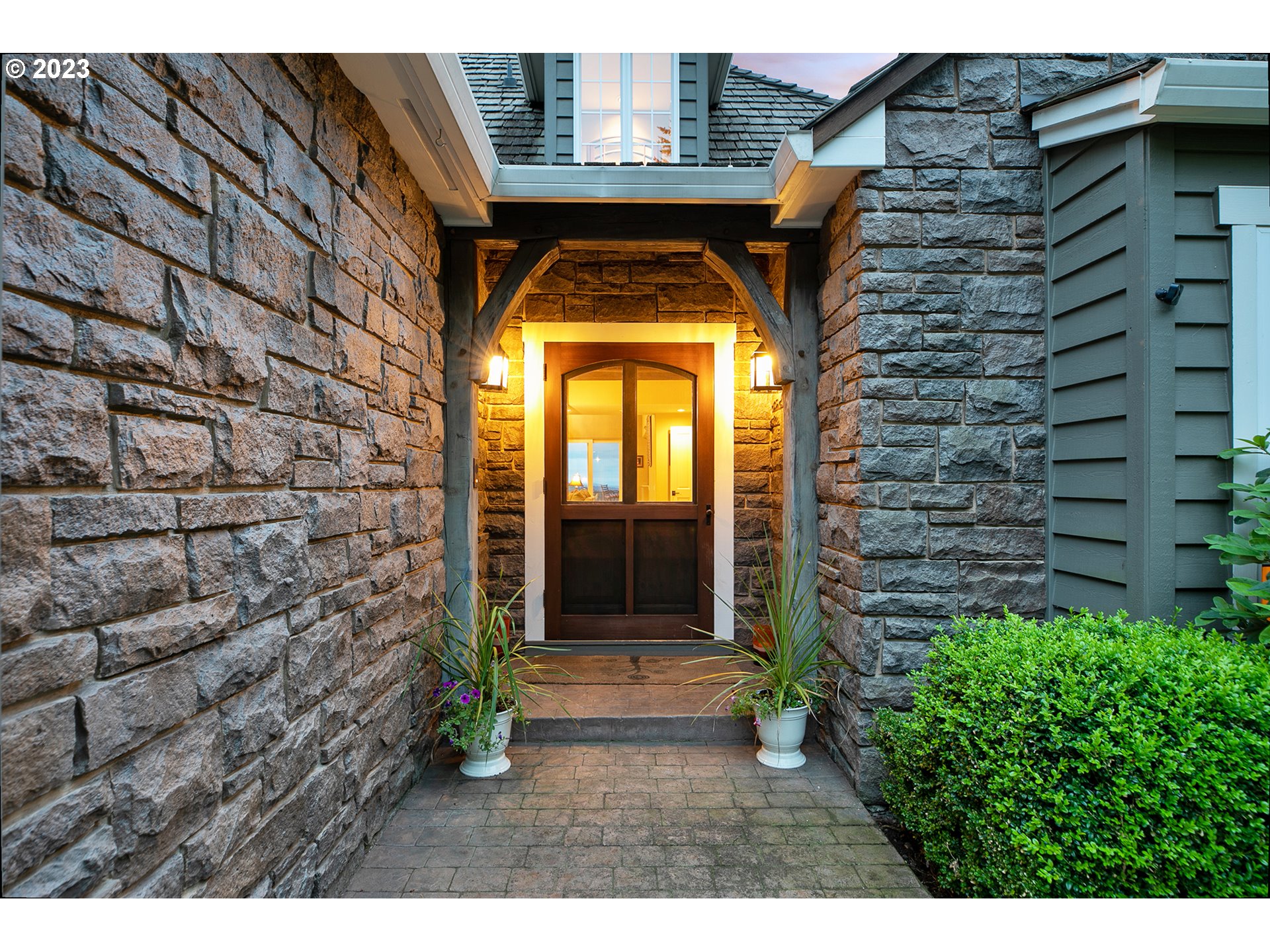 4027 Northwest Devoto Lane Portland, OR 97229 - Photo 4 of 48 a view of entryway with brick walls