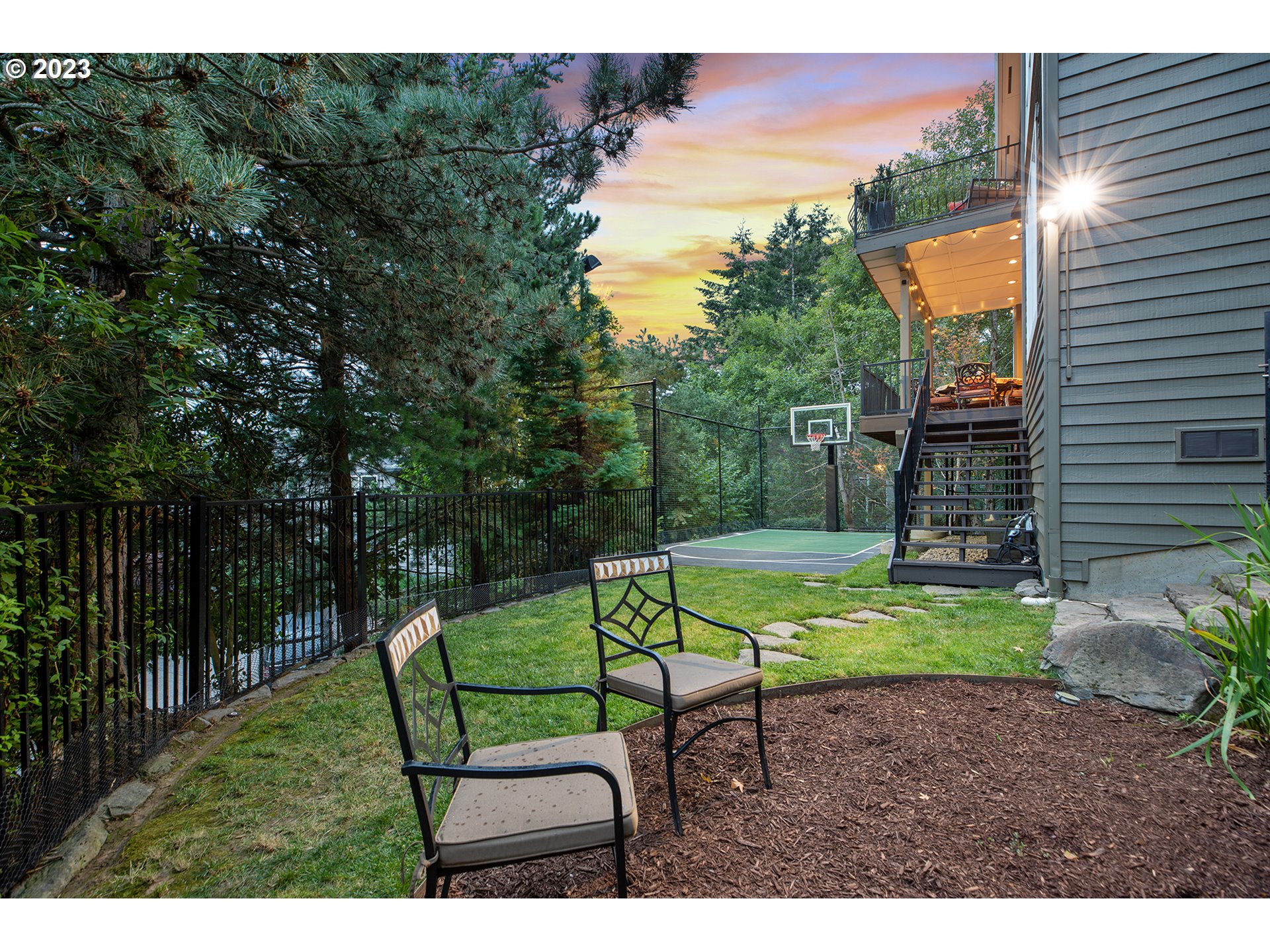 4027 Northwest Devoto Lane Portland, OR 97229 - Photo 40 of 48 a view of a chair and table in the garden