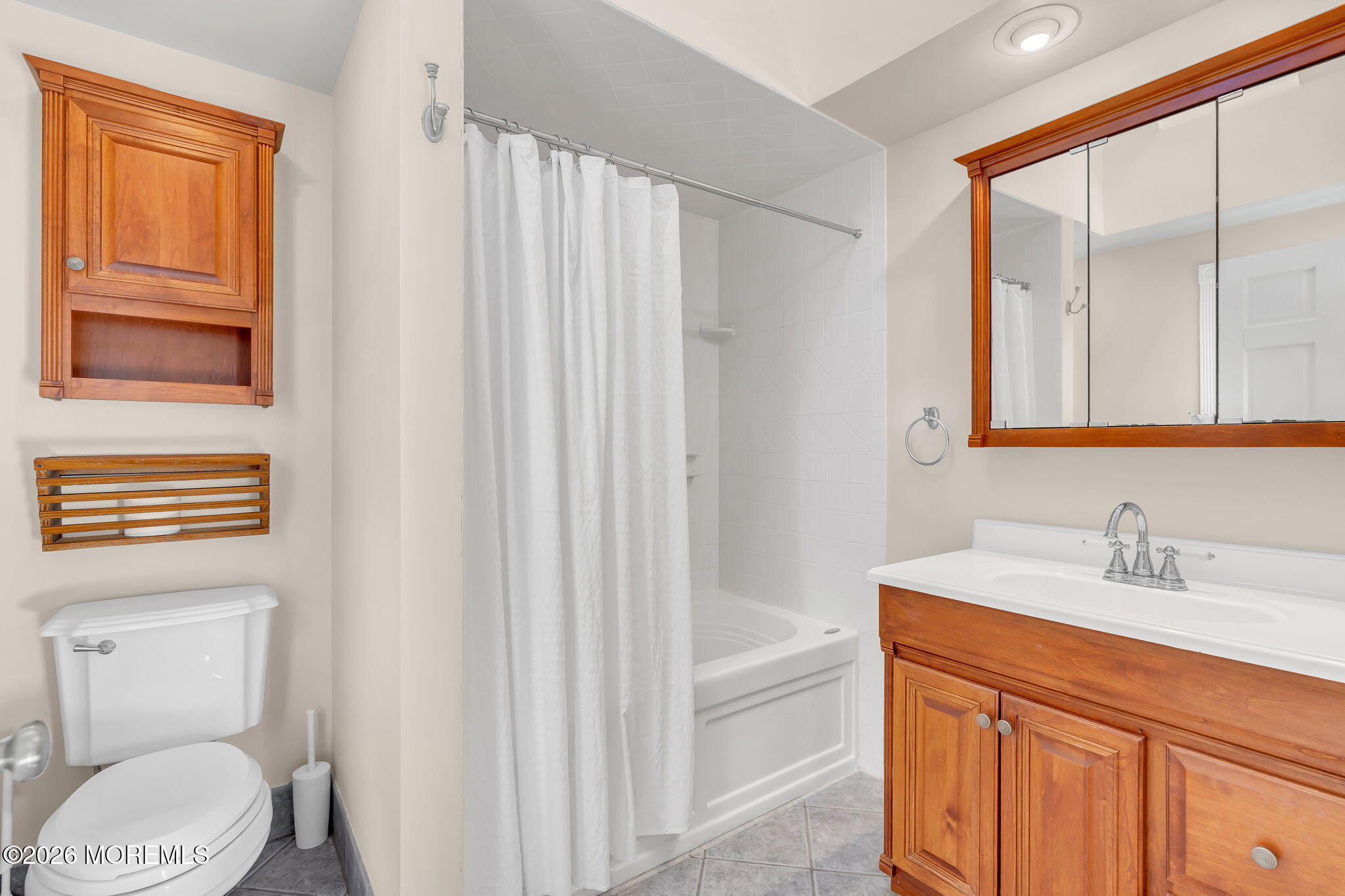 104 Bank Street Red Bank, NJ 07701 - Photo 12 of 16 a bathroom with a sink a toilet and shower