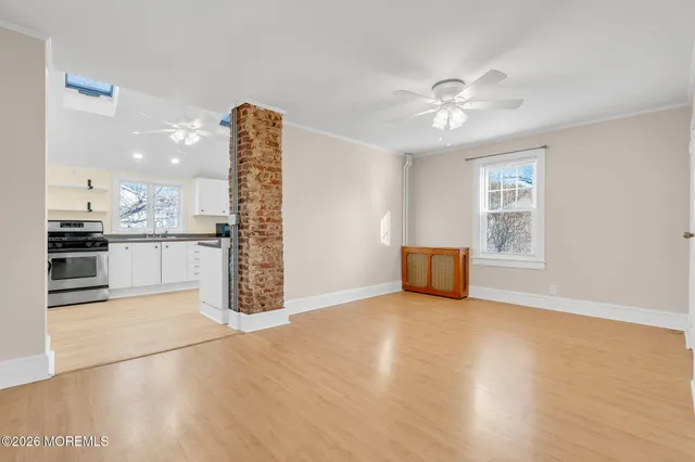 a view of a kitchen with furniture and a kitchen