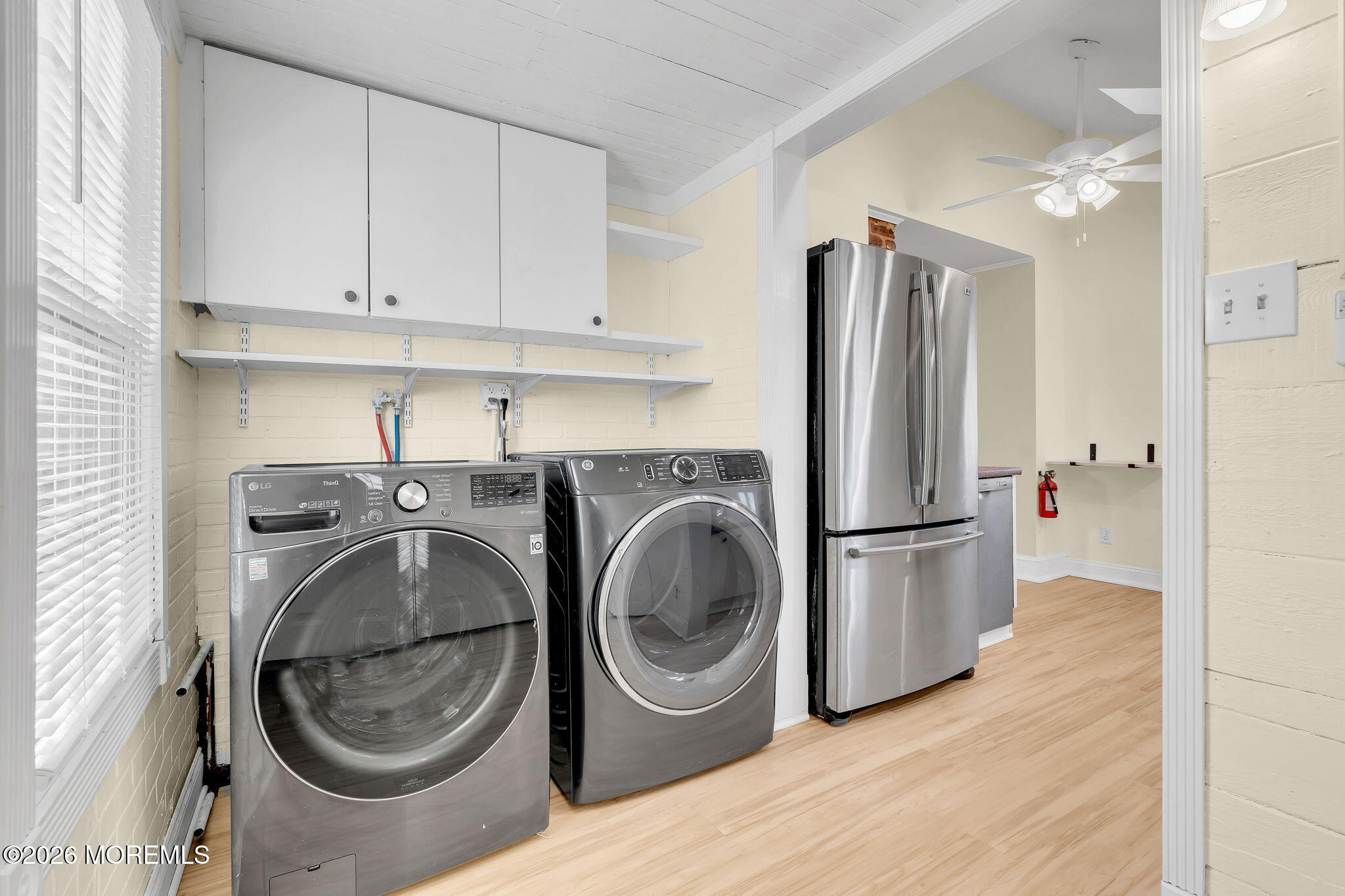 104 Bank Street Red Bank, NJ 07701 - Photo 8 of 16 a utility room with sink dryer and washer