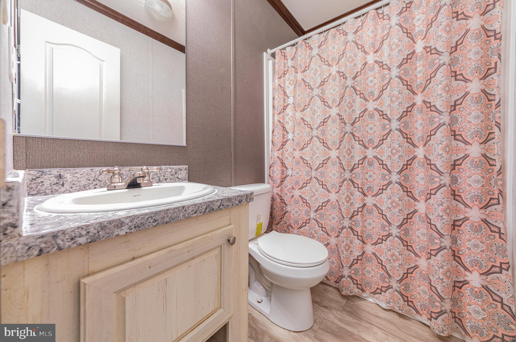 90 Colonial Circle Colonial Beach, VA 22443 - Photo 18 of 27 Hall Bathroom