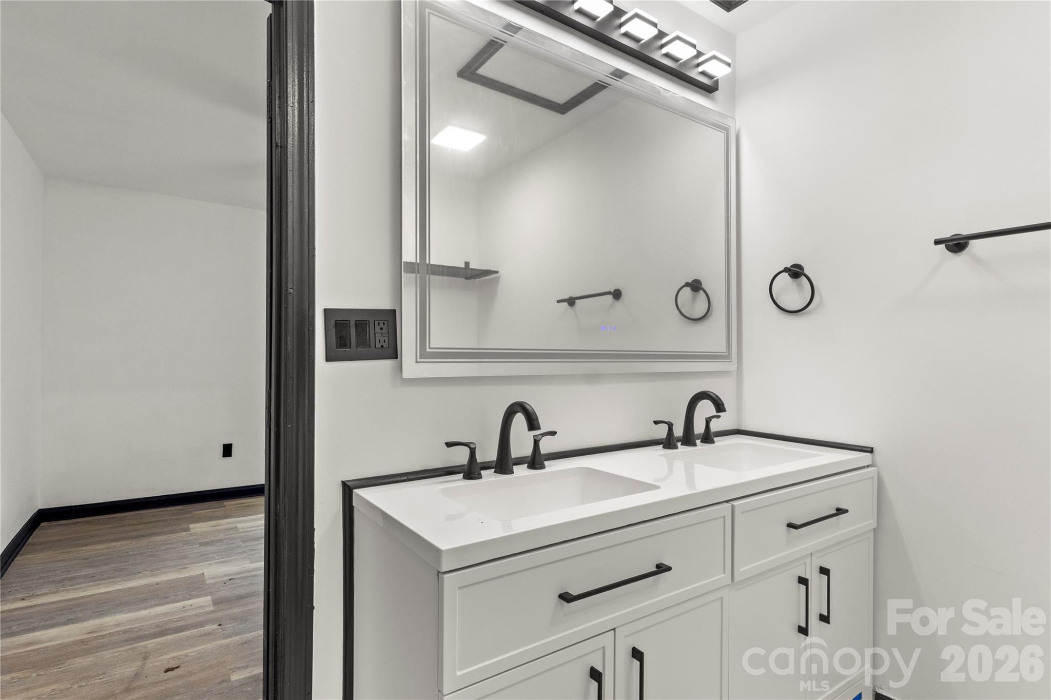 110 Courtland Street Chester, SC 29706 - Photo 19 of 22 a bathroom with a sink and a mirror