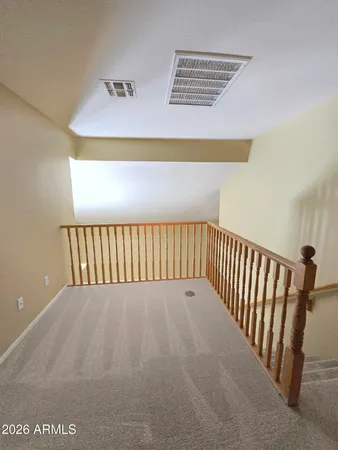 a large bathroom with a sink a large mirror and a shower