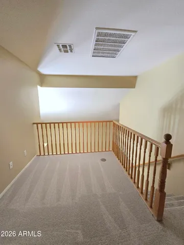 a large bathroom with a sink a large mirror and a shower