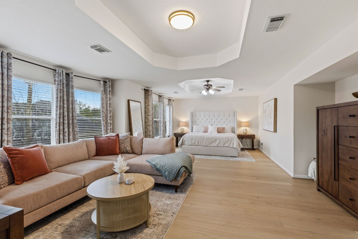 20102 Windbury Court Spring, TX 77379 - Photo 18 of 49 This enoromous primary bedroom has lovely tray ceilings and a sitting room.