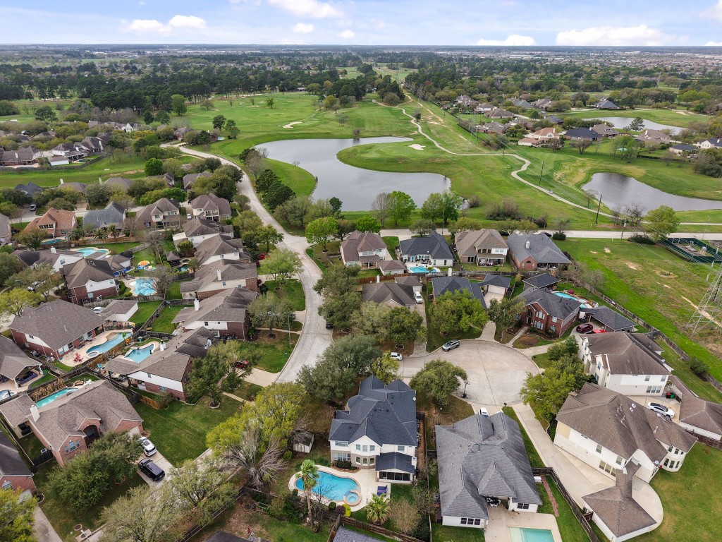 20102 Windbury Court Spring, TX 77379 - Photo 37 of 49 The walking trails around the ponds and golf course are nearby.
