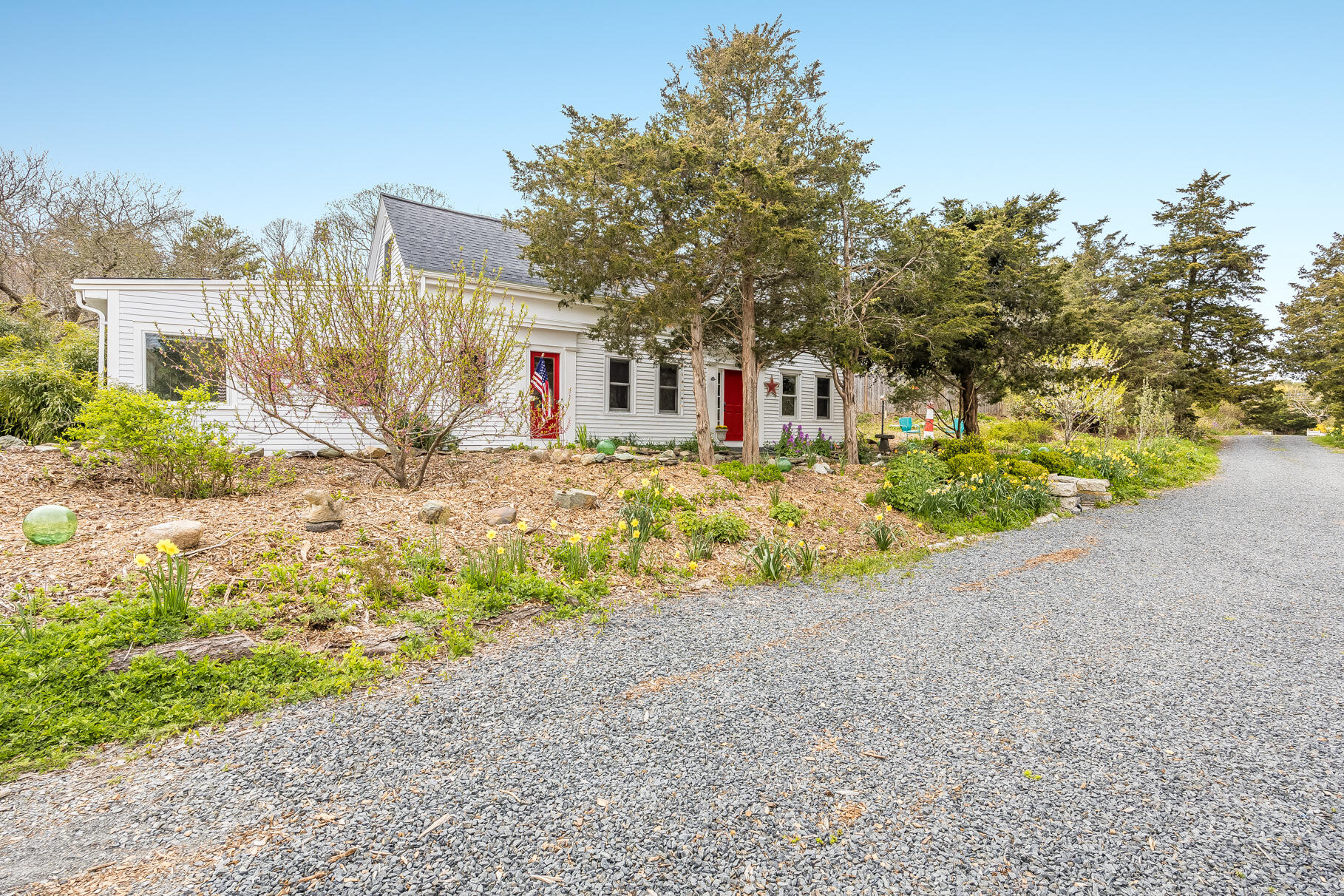 2147 Route 6 Wellfleet, MA 02667 - Photo 1 of 98 a front view of a house with a yard and garage