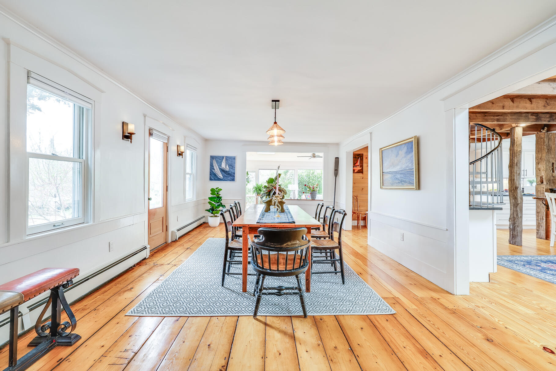 2147 Route 6 Wellfleet, MA 02667 - Photo 13 of 98 a dining room with wooden floor and window