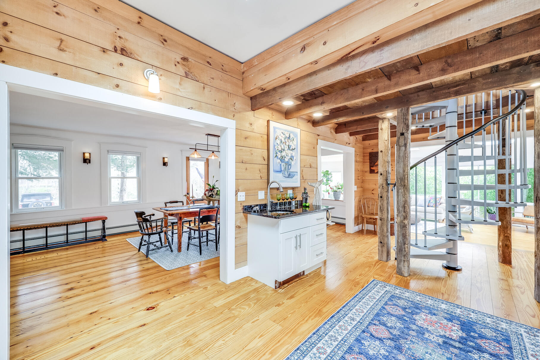 2147 Route 6 Wellfleet, MA 02667 - Photo 22 of 98 a living room filled with furniture and a table
