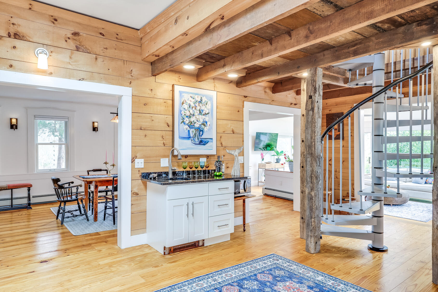 2147 Route 6 Wellfleet, MA 02667 - Photo 28 of 98 a living room with stainless steel appliances granite countertop furniture wooden floor and a large window