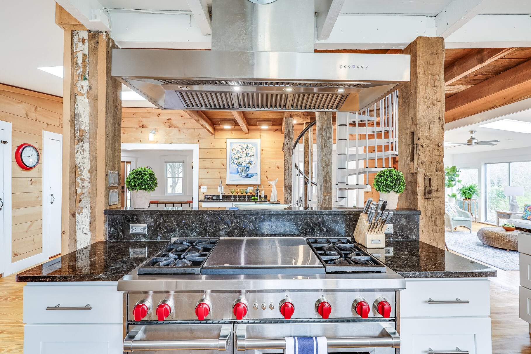 2147 Route 6 Wellfleet, MA 02667 - Photo 29 of 98 a kitchen with a stove and a white cabinets