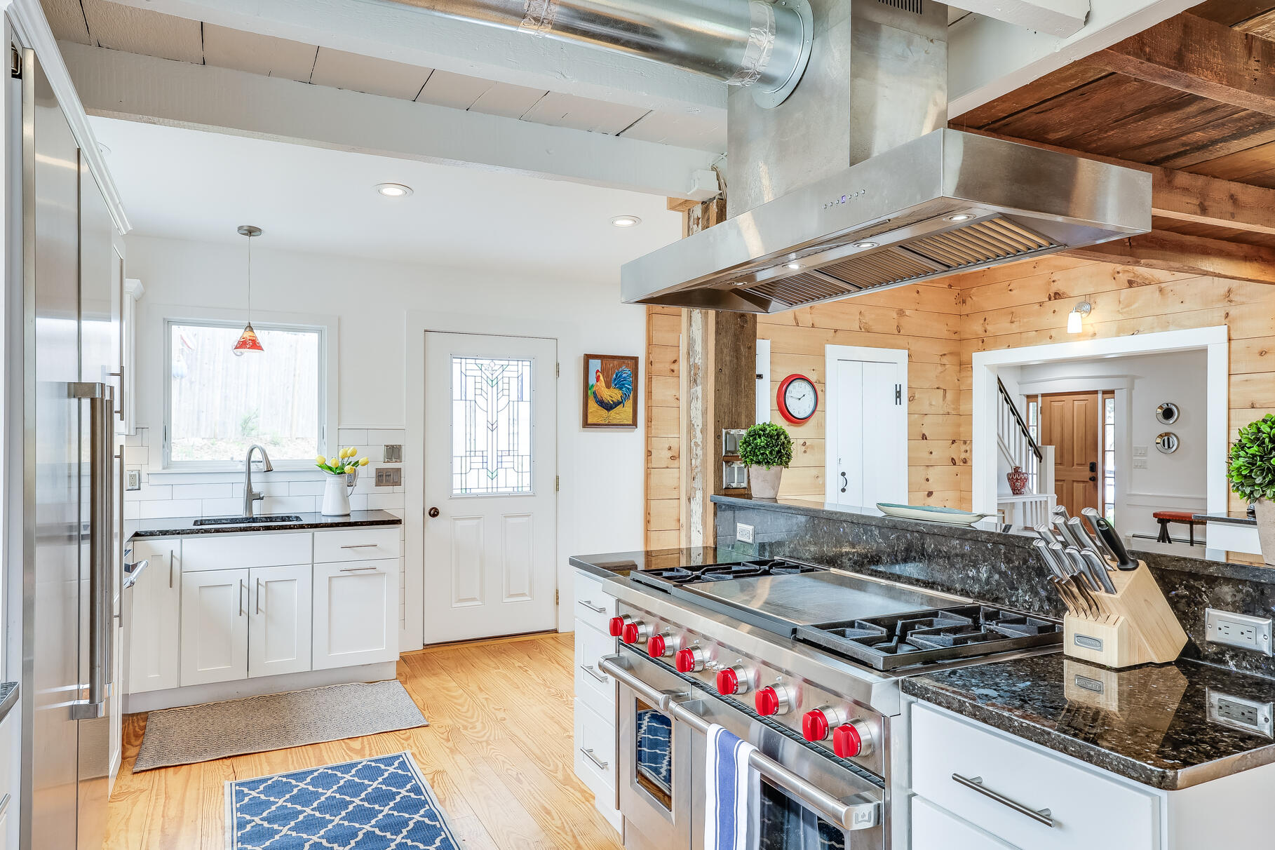 2147 Route 6 Wellfleet, MA 02667 - Photo 38 of 98 a kitchen with stainless steel appliances granite countertop a sink and cabinets