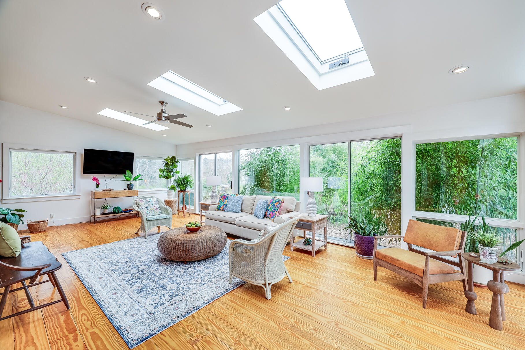 2147 Route 6 Wellfleet, MA 02667 - Photo 43 of 98 a living room with furniture and a flat screen tv