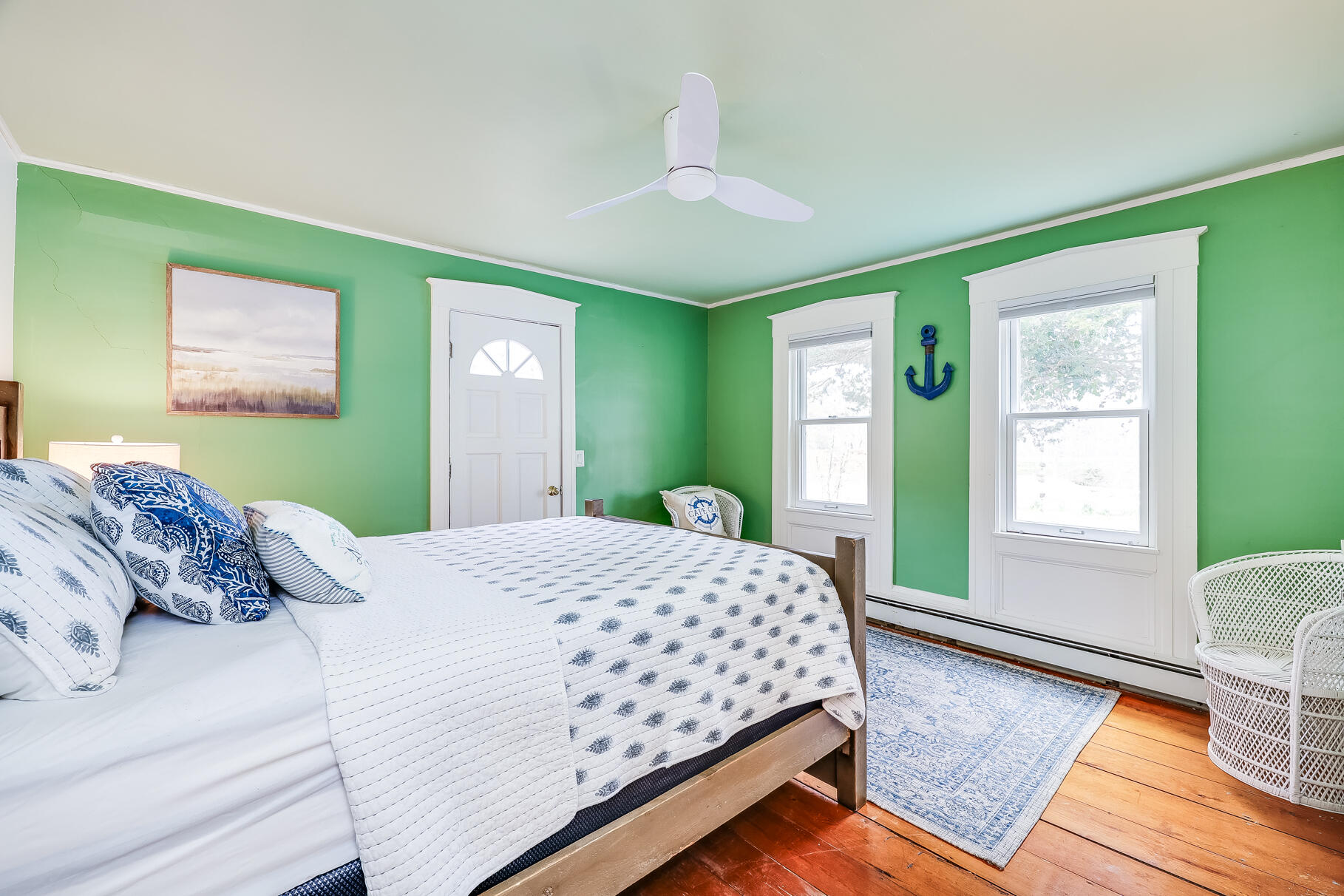2147 Route 6 Wellfleet, MA 02667 - Photo 61 of 98 a bedroom with a bed wooden floor and window