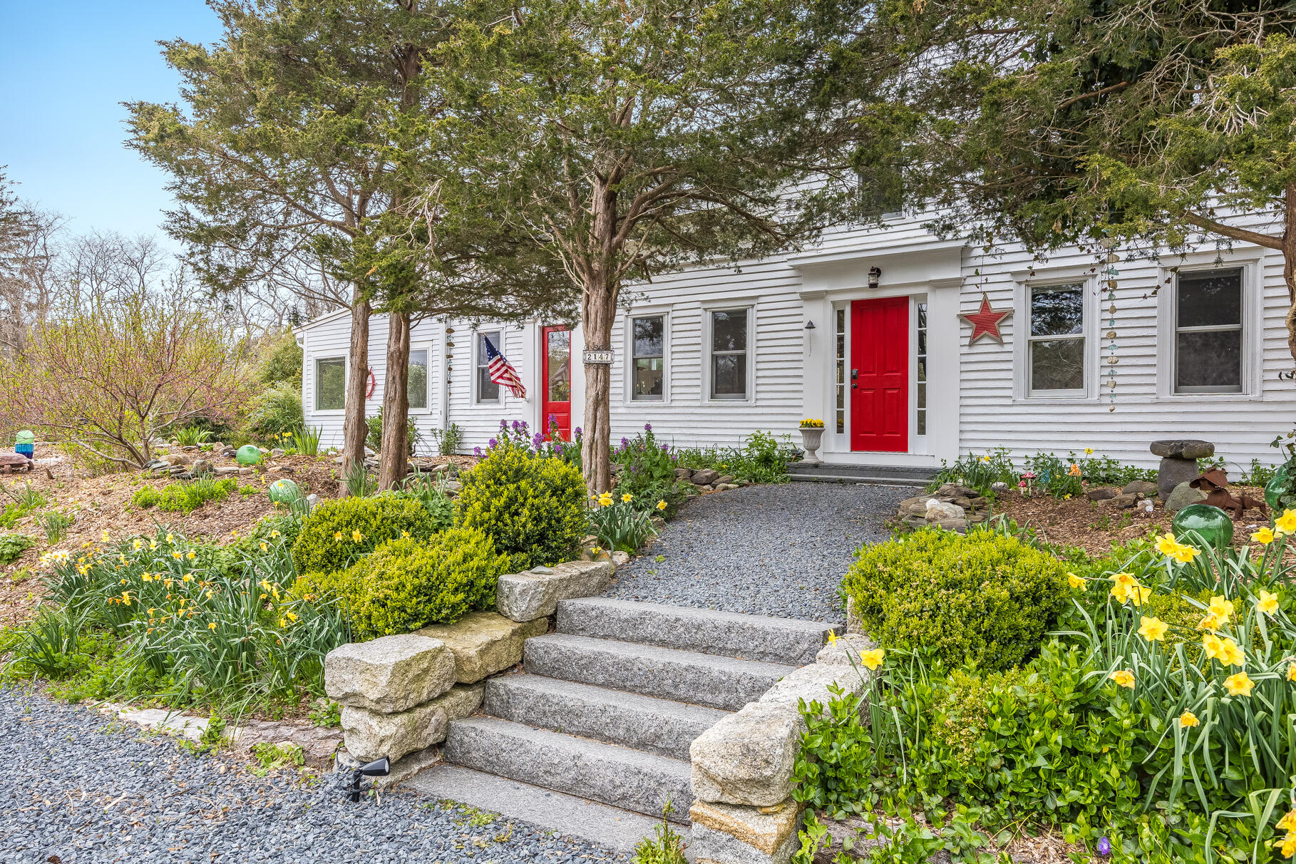 2147 Route 6 Wellfleet, MA 02667 - Photo 7 of 98 a front view of a house with garden