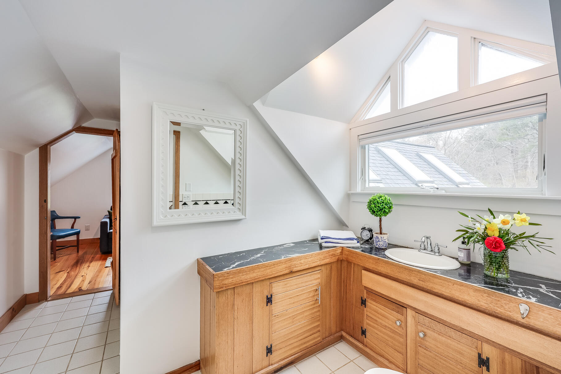 2147 Route 6 Wellfleet, MA 02667 - Photo 79 of 98 a kitchen with stainless steel appliances cabinets a potted plant and a window