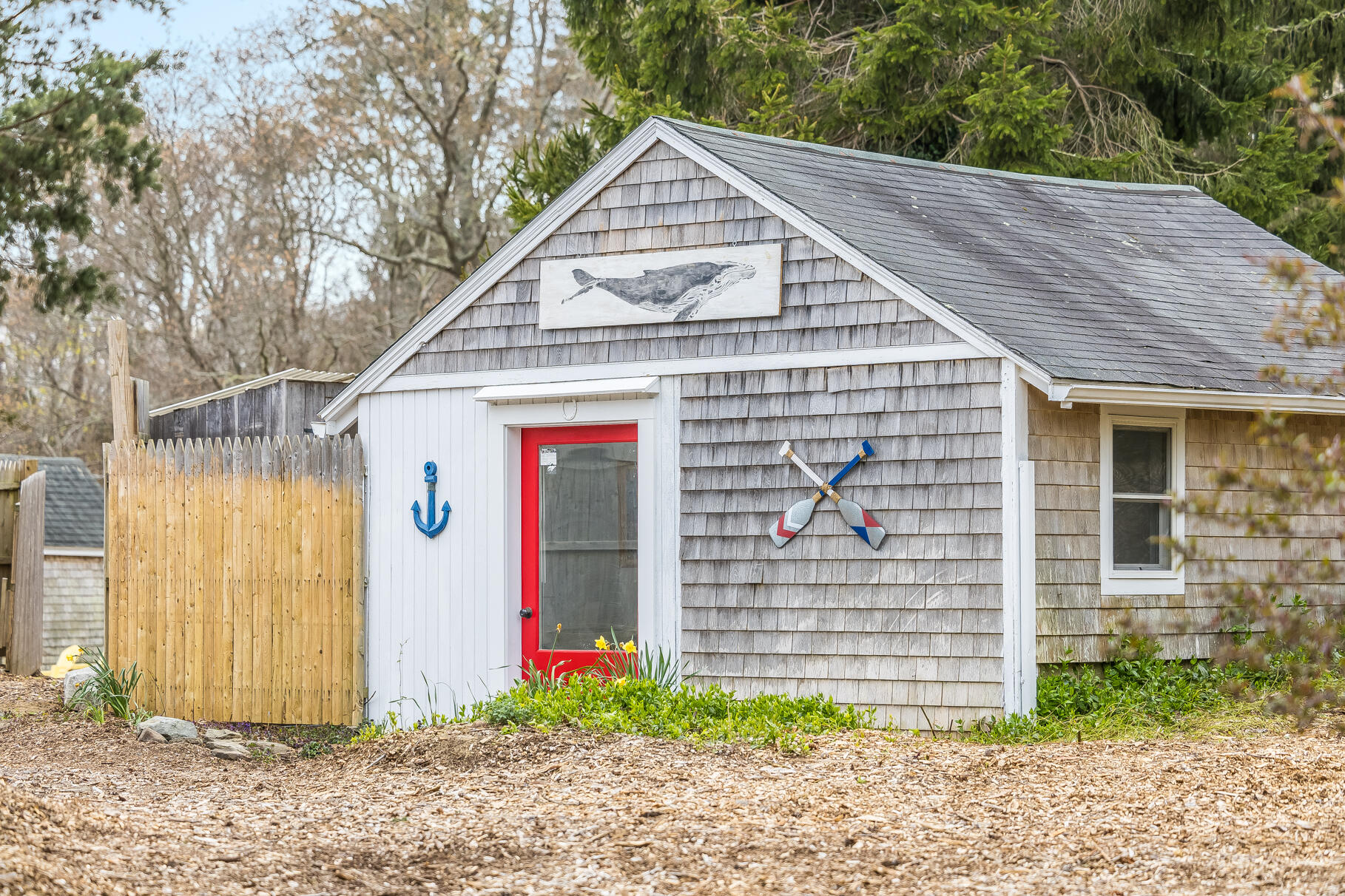 2147 Route 6 Wellfleet, MA 02667 - Photo 91 of 98 a front view of a house with garage