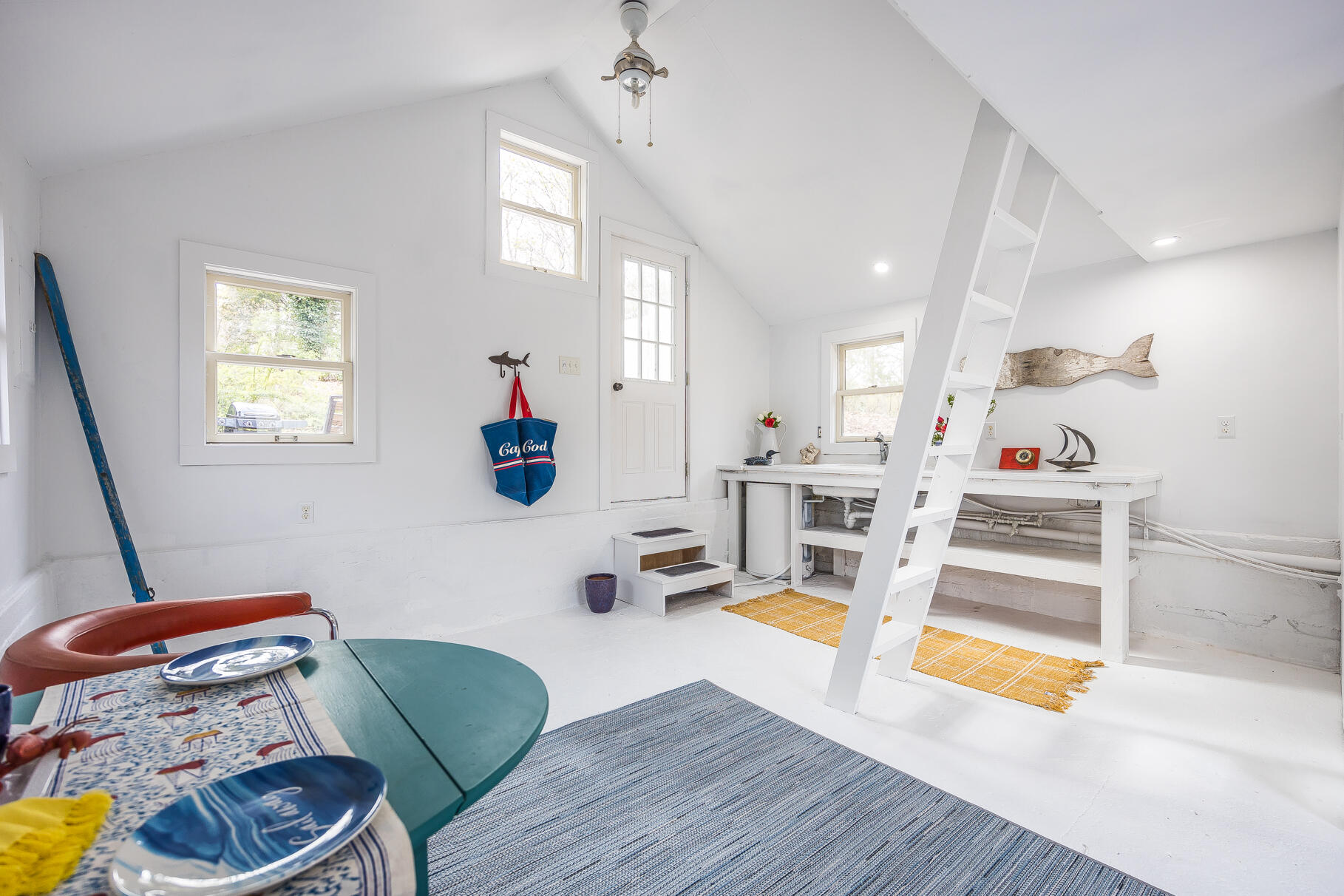2147 Route 6 Wellfleet, MA 02667 - Photo 94 of 98 a living room with furniture and a wooden floor