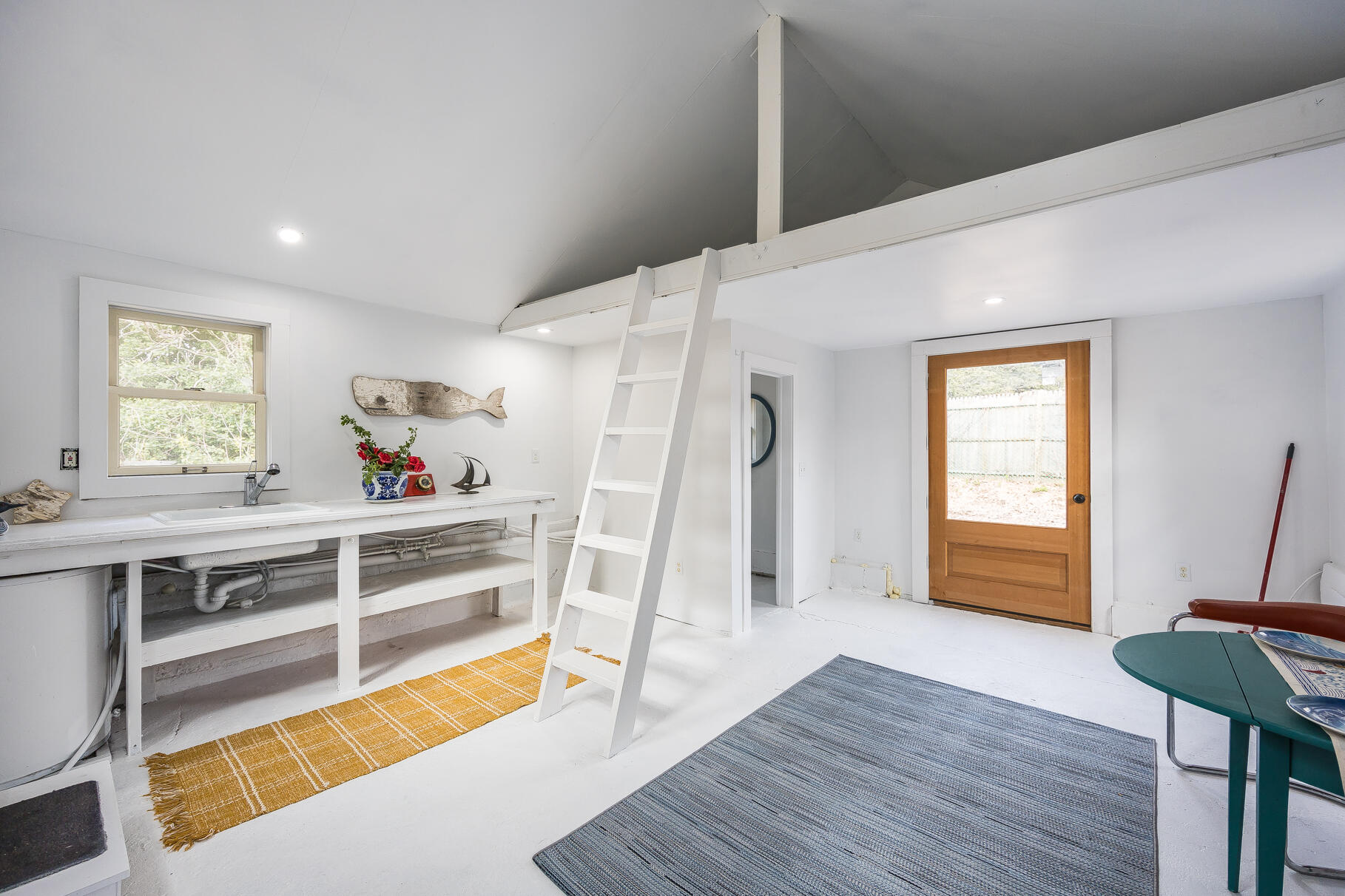 2147 Route 6 Wellfleet, MA 02667 - Photo 95 of 98 a view of a room with wooden floor and window