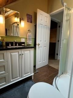 45 Willadell Road Transfer, PA 16154 - Photo 22 of 29 a bathroom with a granite countertop toilet sink and mirror