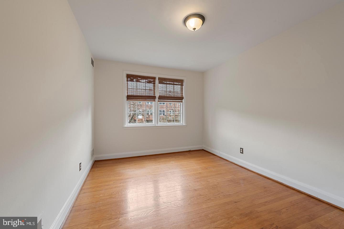 183 Stanmore Road Baltimore, MD 21212 - Photo 16 of 32 an empty room with a window