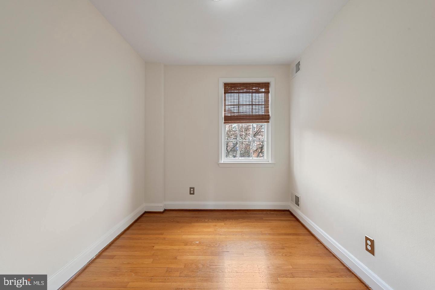183 Stanmore Road Baltimore, MD 21212 - Photo 21 of 32 a view of an empty room with a window