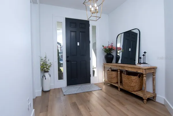 a view of a backyard with sitting area