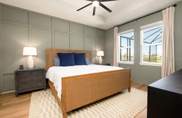 a bedroom with a bed and a couch