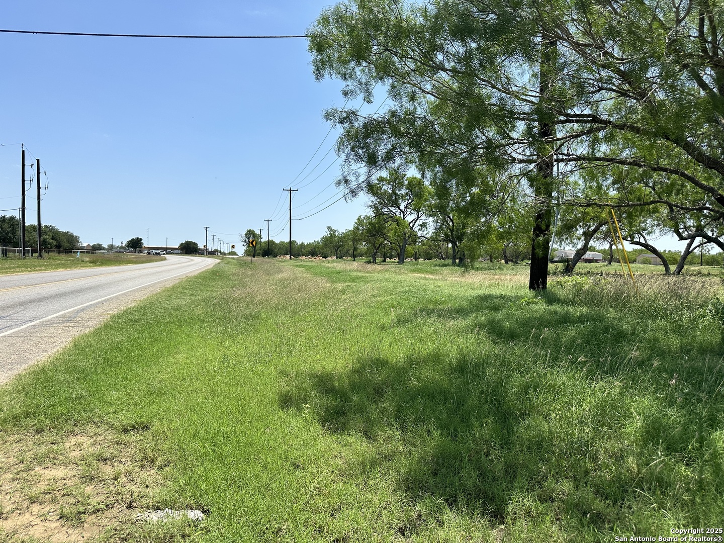 0 Las Palomas Track 2 Lytle, TX 78052 - Photo 12 of 12 a view of a big yard with large trees