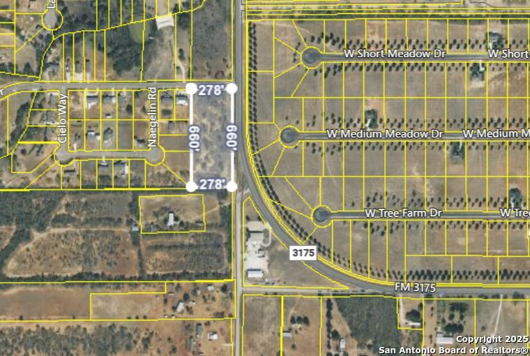 0 Las Palomas Track 2 Lytle, TX 78052 - Photo 4 of 12 a view of a building with a glass door