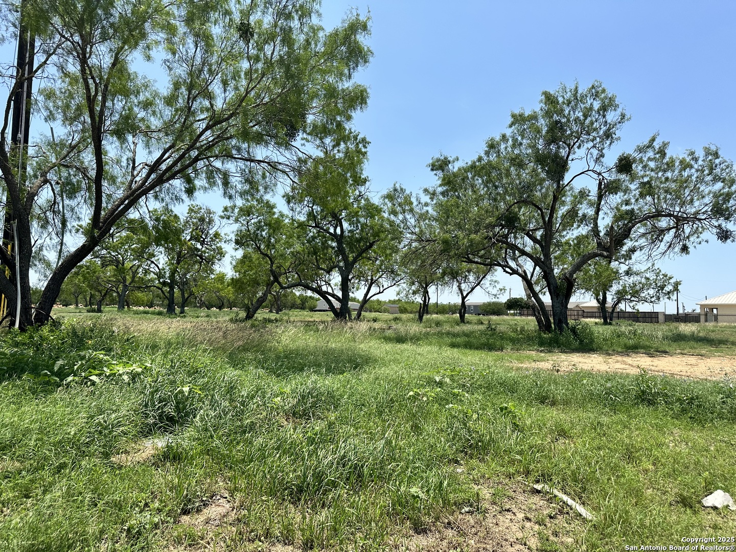 0 Las Palomas Track 2 Lytle, TX 78052 - Photo 9 of 12 a view of backyard with green space