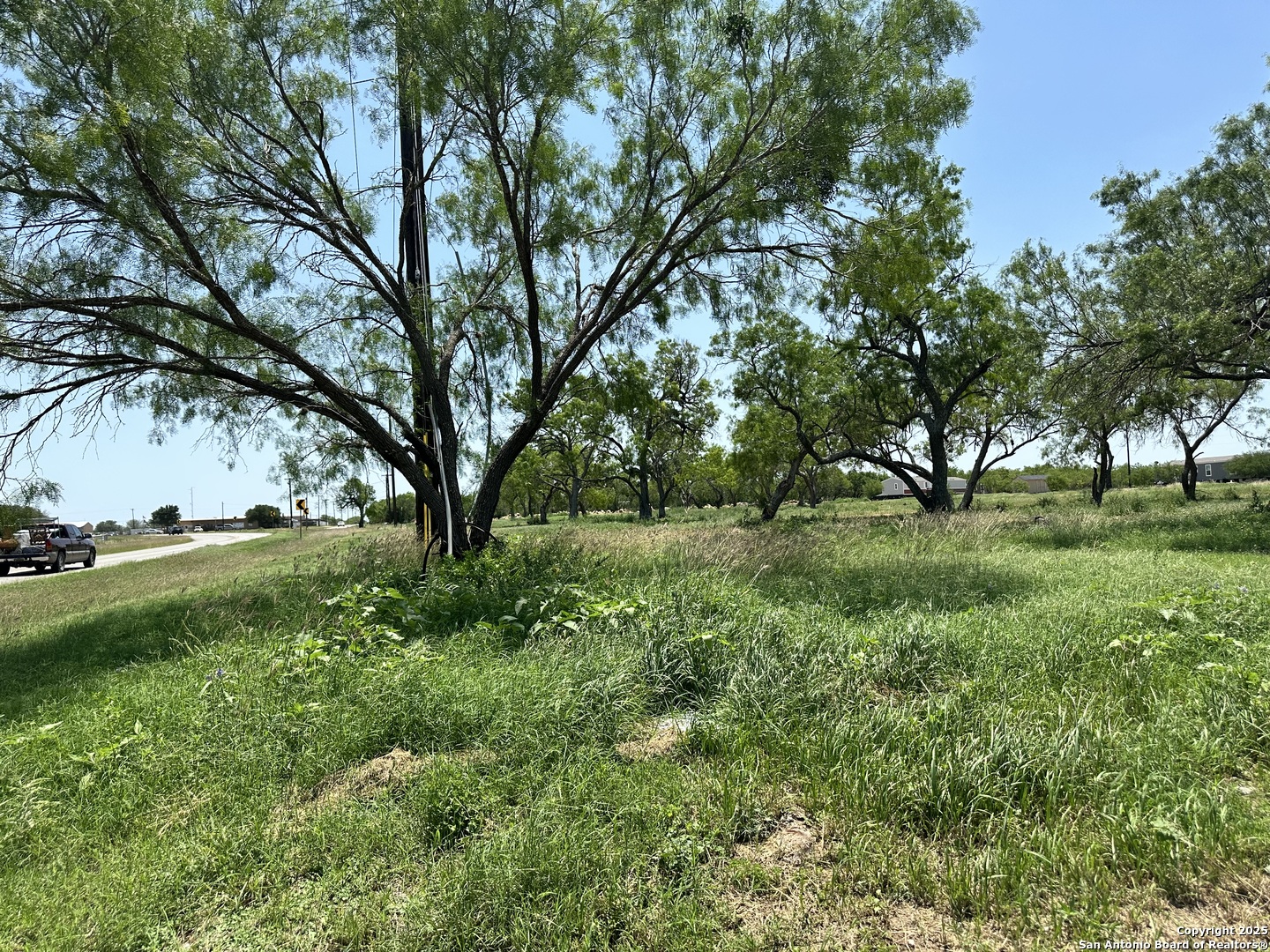 0 Las Palomas Track 2 Lytle, TX 78052 - Photo 10 of 12 a view of grassy field with benches