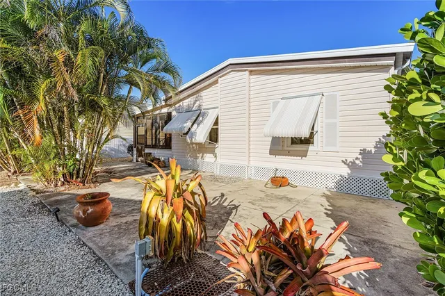 a view of a backyard with a patio
