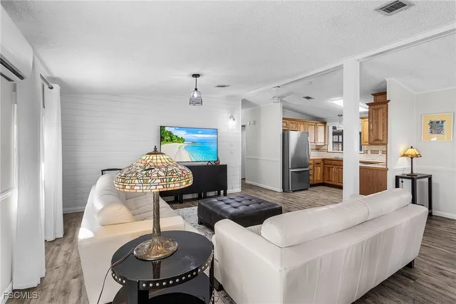 a living room with furniture and a table