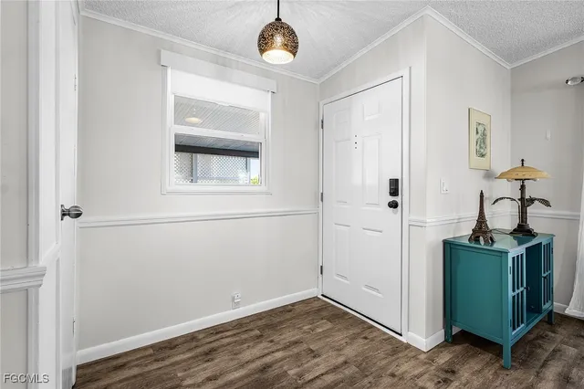a view of a room with rack and wooden floor