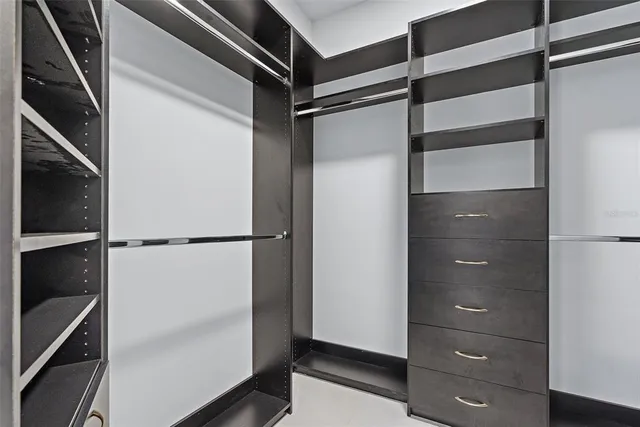 a bathroom with a toilet sink and shower