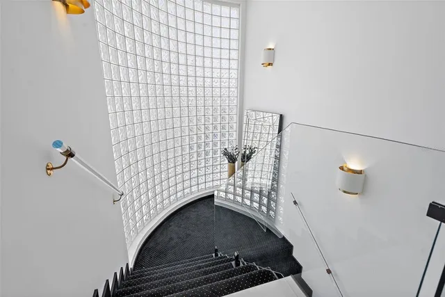 a bedroom with windows