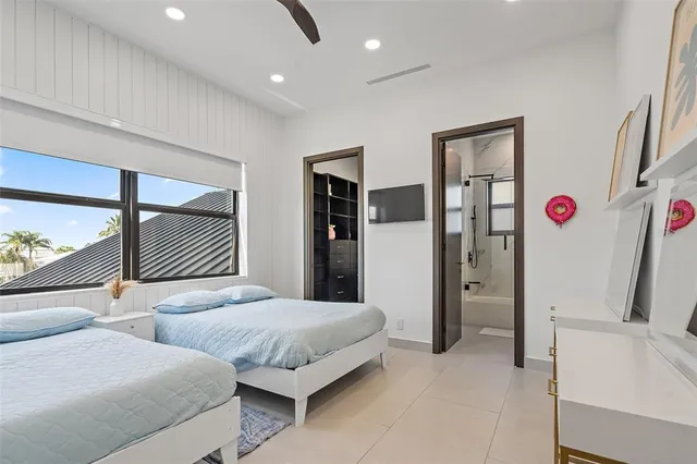 a view of living room with granite countertop furniture and floor to ceiling window