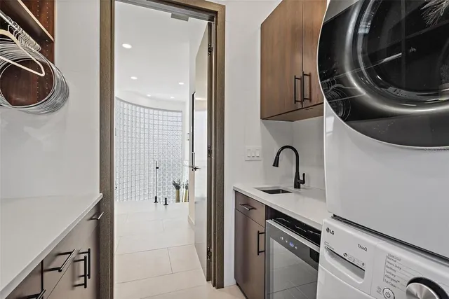 a view of a lake with a table and chairs