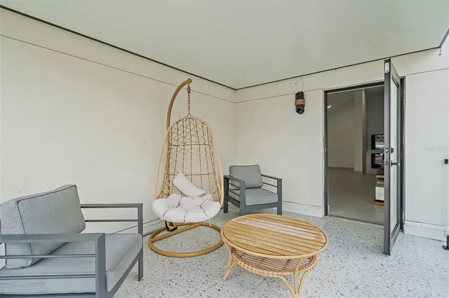 a view of a lake with boats and trees in the background
