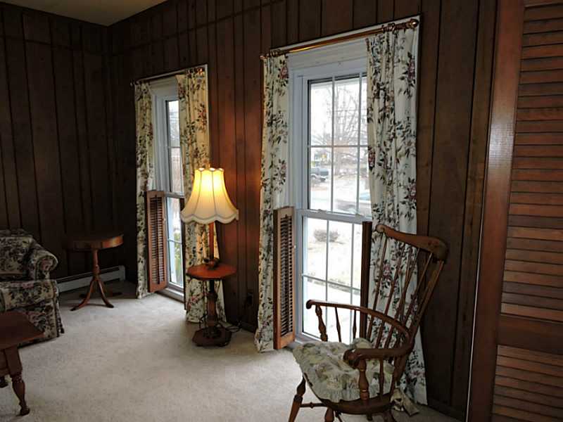 35 County Road Barrington, RI 02806 - Photo 6 of 25 Living Room. Living room windows look onto front porch...