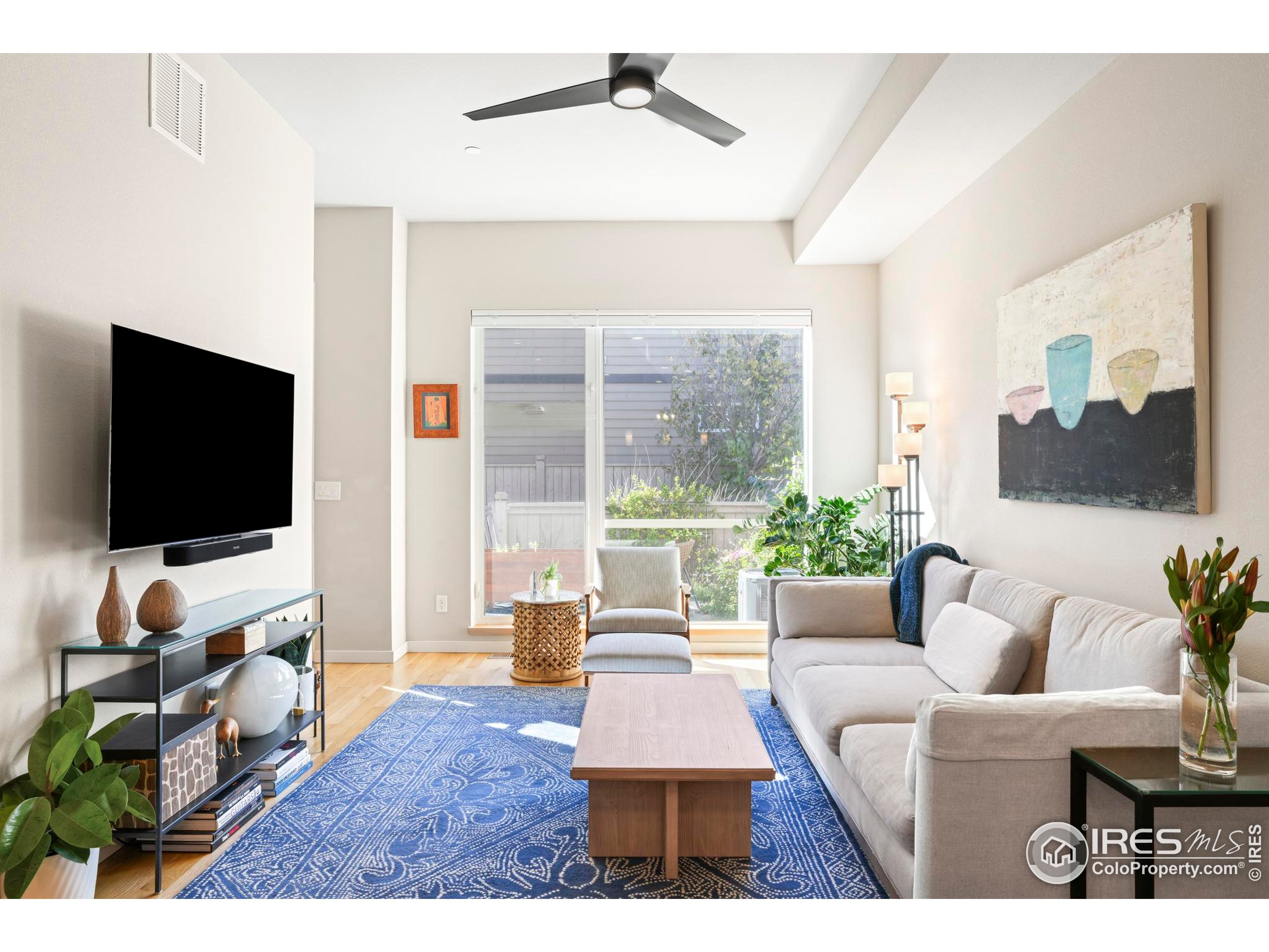 4190 Longview Lane Boulder, CO 80301 - Photo 5 of 25 a living room with furniture and a flat screen tv