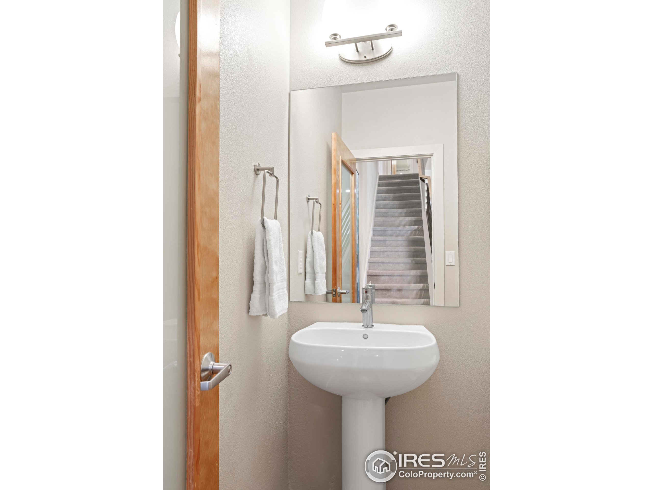 4190 Longview Lane Boulder, CO 80301 - Photo 10 of 25 a bathroom with a sink and a mirror